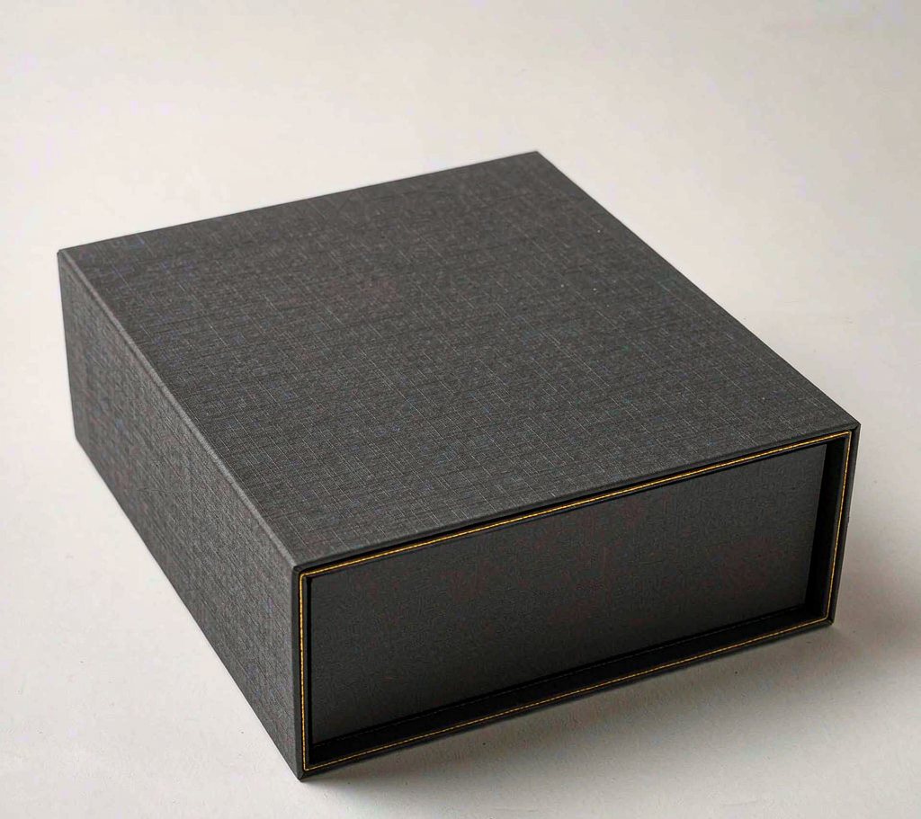 Matte charcoal rigid box with gold edge